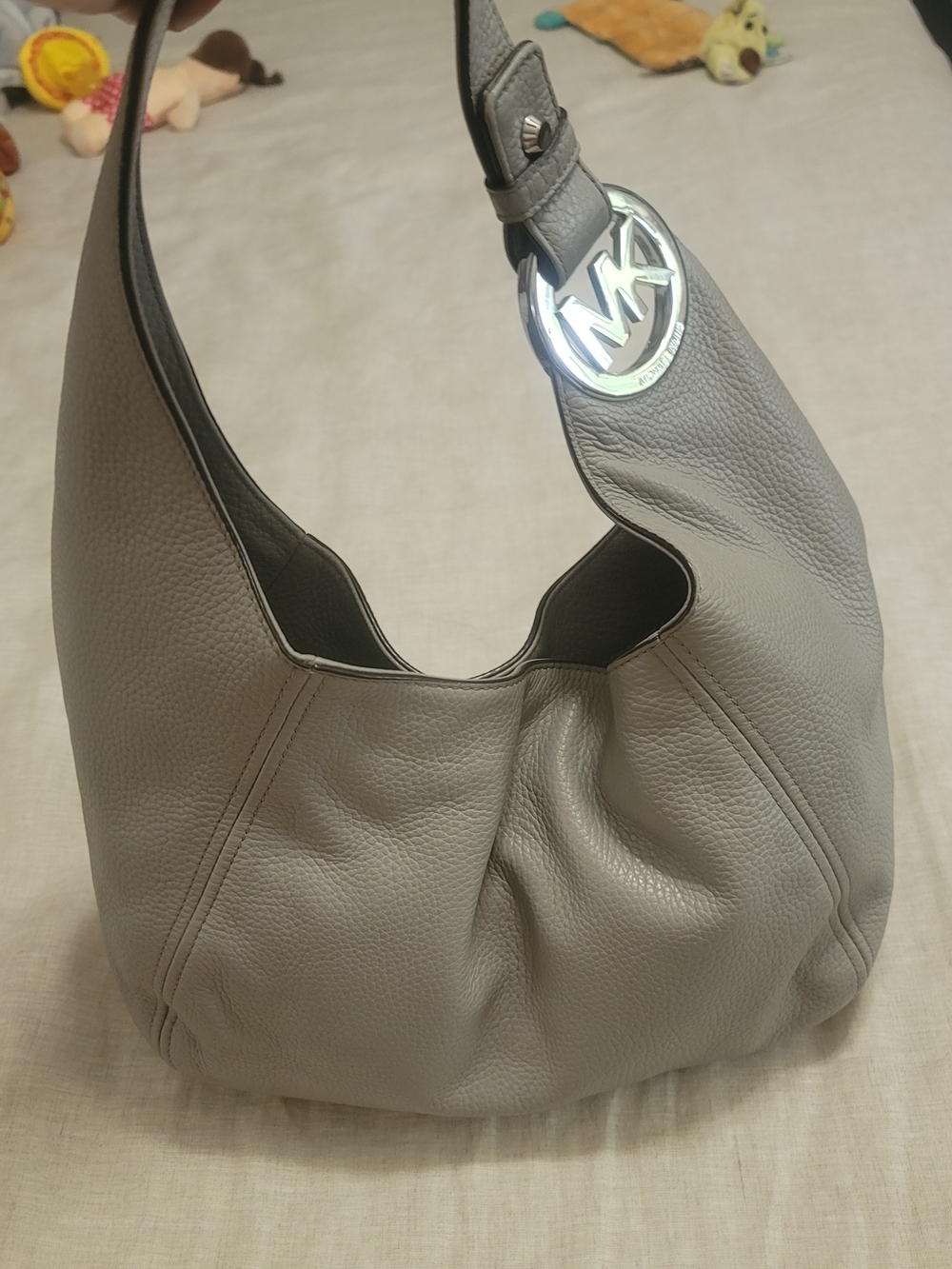 Michael Kors Pebbled Leather Hobo Bag in Light Gray with Silver MK Charm